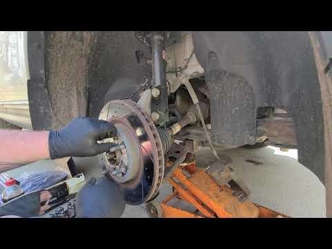 How to change front brake pads and rotors on a 2011 Ford explorer